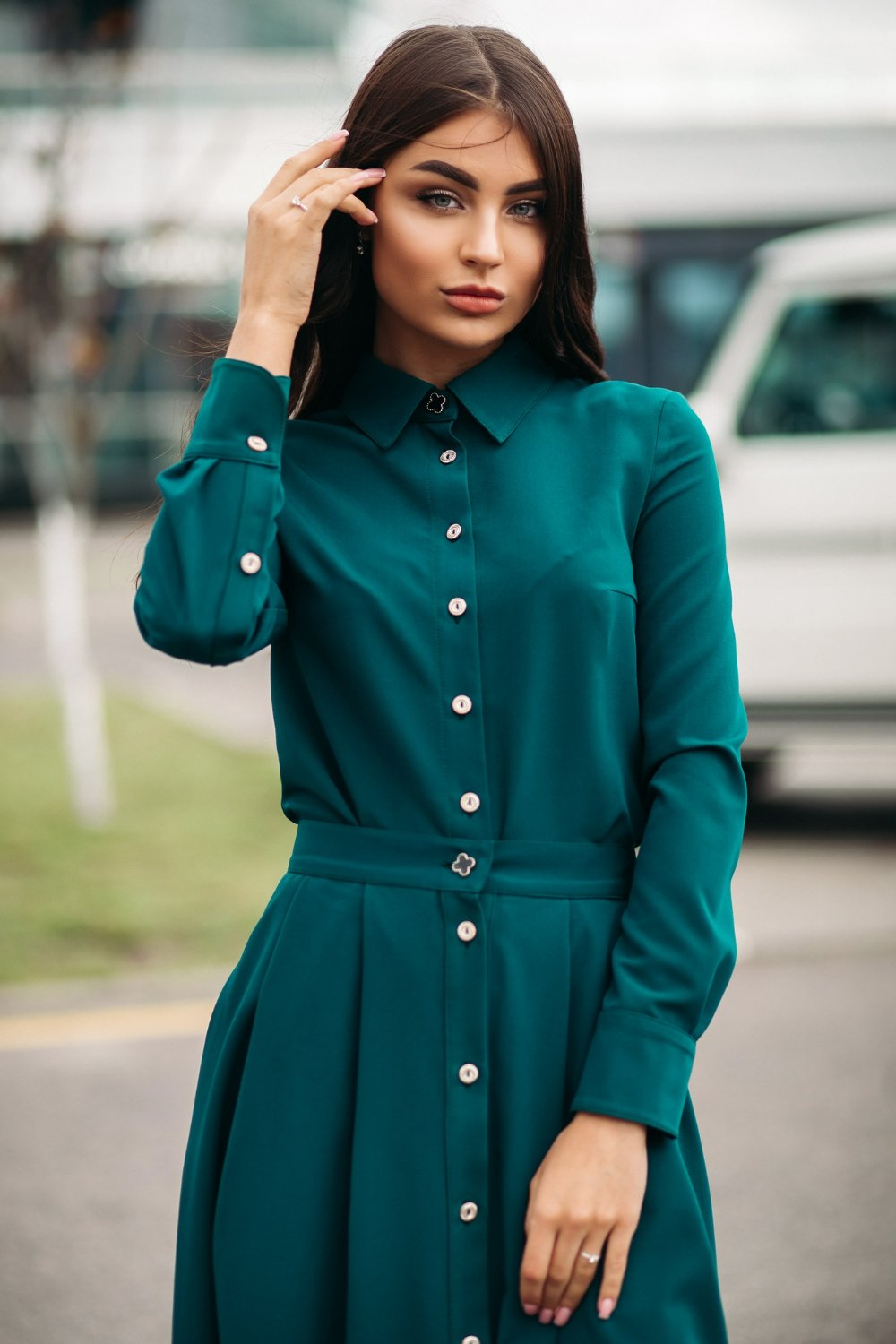 Teal button-up blouse